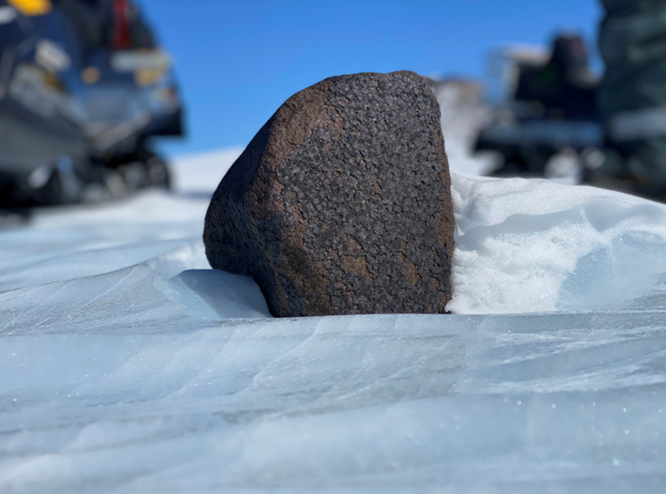 The team spotted one of the biggest meteorites ever found in Antarctica protruding from the ice.