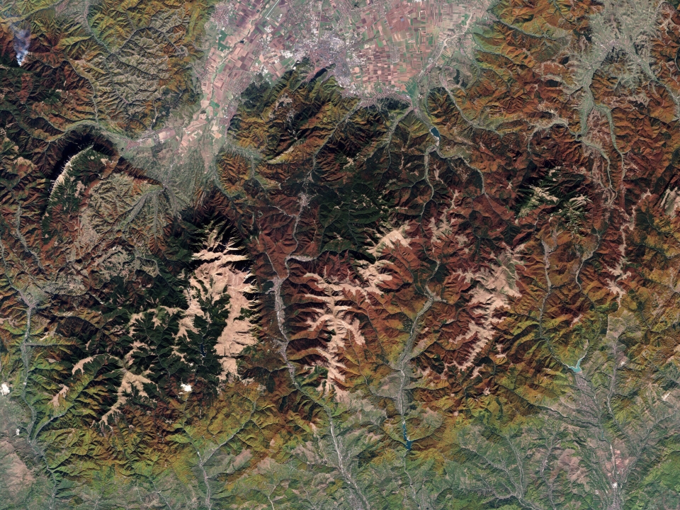 Part of the southeastern Carpathian Mountains in central Romania is featured in this Copernicus Sentinel-2 image from 26 October 2024.