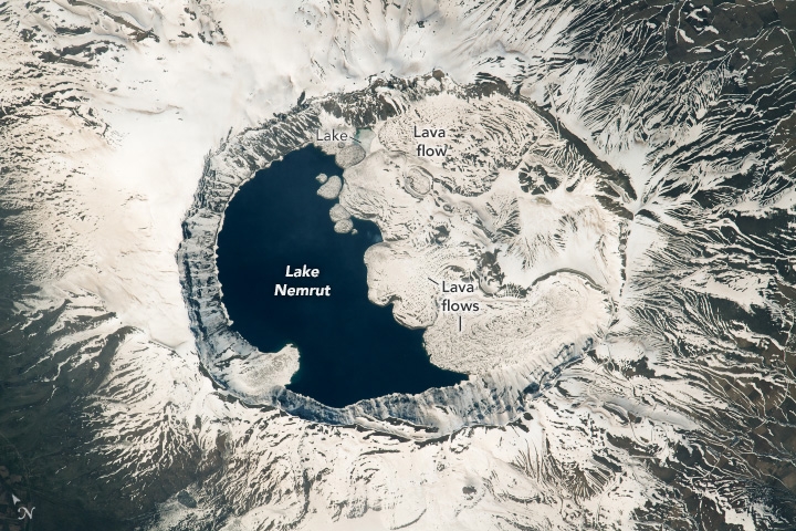 Lakes and lava flows fill the depression atop this geologically young stratovolcano in eastern Türkiye.